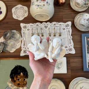 Pair of White Ceramic Cherub Figurines